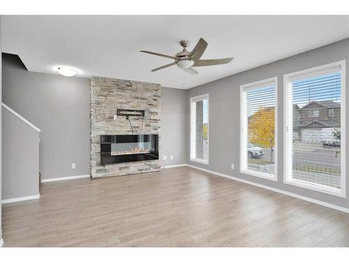 812-339 Viscount Drive, Red Deer, AB - Indoor Photo Showing Living Room With Fireplace