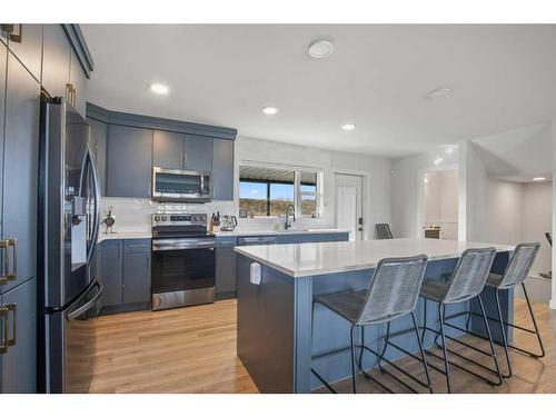 4162 Ryders Ridge Boulevard, Sylvan Lake, AB - Indoor Photo Showing Kitchen With Stainless Steel Kitchen With Upgraded Kitchen