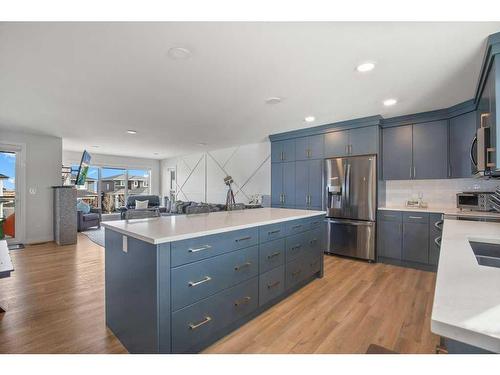 4162 Ryders Ridge Boulevard, Sylvan Lake, AB - Indoor Photo Showing Kitchen With Stainless Steel Kitchen With Double Sink With Upgraded Kitchen