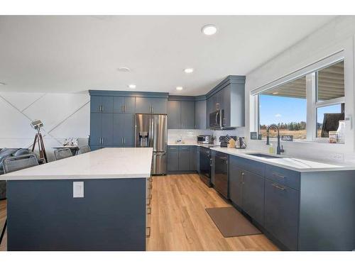 4162 Ryders Ridge Boulevard, Sylvan Lake, AB - Indoor Photo Showing Kitchen With Stainless Steel Kitchen With Upgraded Kitchen