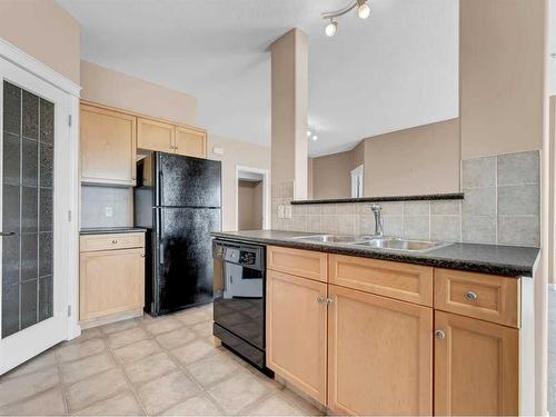 328-201 River Ridge Drive Nw, Medicine Hat, AB - Indoor Photo Showing Kitchen With Double Sink