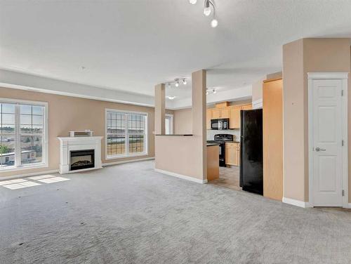 328-201 River Ridge Drive Nw, Medicine Hat, AB - Indoor With Fireplace