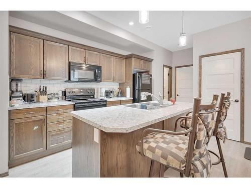 1 Maclean Close, Blackfalds, AB - Indoor Photo Showing Kitchen With Double Sink