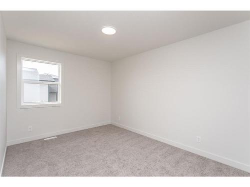 643 Robinson Avenue, Penhold, AB - Indoor Photo Showing Other Room