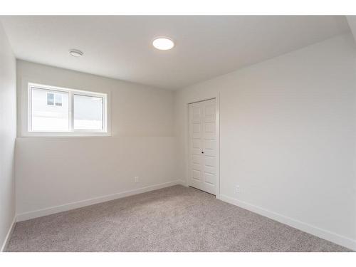 643 Robinson Avenue, Penhold, AB - Indoor Photo Showing Other Room