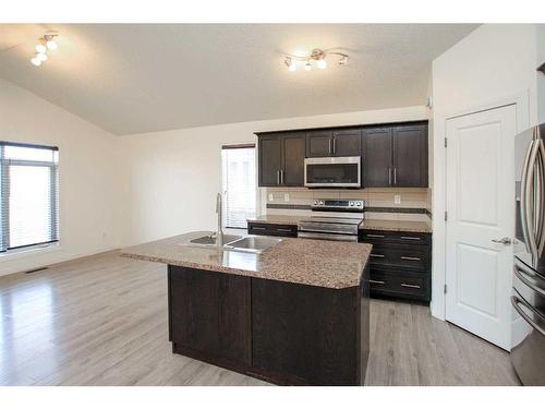 10 Cedar Square, Blackfalds, AB - Indoor Photo Showing Kitchen With Stainless Steel Kitchen With Double Sink