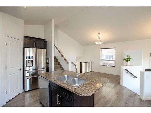 10 Cedar Square, Blackfalds, AB - Indoor Photo Showing Kitchen With Double Sink