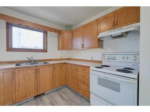 22 Dixon Crescent, Red Deer, AB - Indoor Photo Showing Kitchen With Double Sink