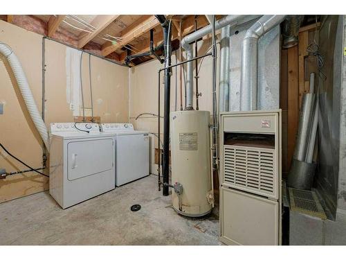 22 Dixon Crescent, Red Deer, AB - Indoor Photo Showing Laundry Room