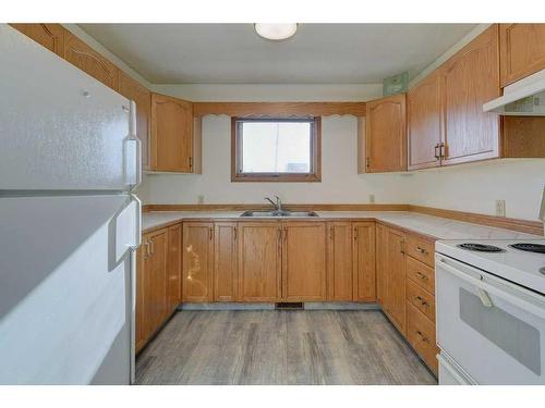 22 Dixon Crescent, Red Deer, AB - Indoor Photo Showing Kitchen With Double Sink