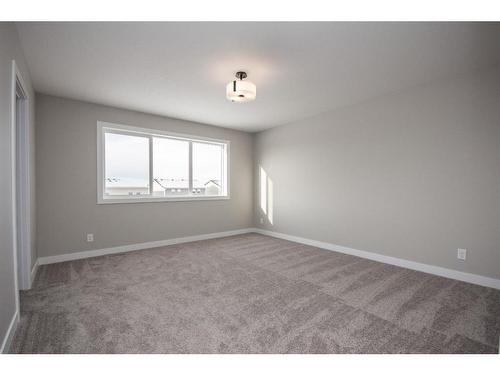 122 Mann Drive, Penhold, AB - Indoor Photo Showing Other Room