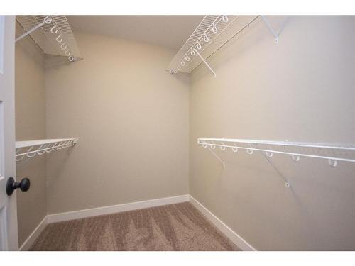 122 Mann Drive, Penhold, AB - Indoor With Storage