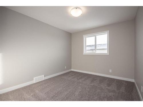 122 Mann Drive, Penhold, AB - Indoor Photo Showing Other Room