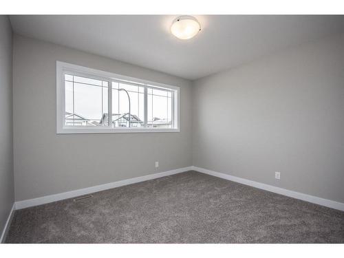 122 Mann Drive, Penhold, AB - Indoor Photo Showing Other Room