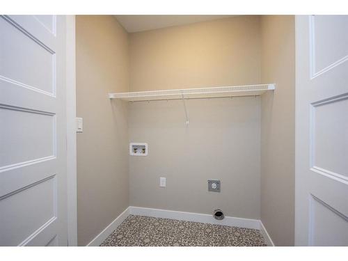 122 Mann Drive, Penhold, AB - Indoor Photo Showing Other Room