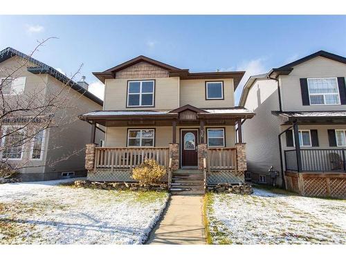 56 Lodge Place, Sylvan Lake, AB - Outdoor With Deck Patio Veranda With Facade