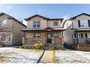 56 Lodge Place, Sylvan Lake, AB  - Outdoor With Deck Patio Veranda With Facade 