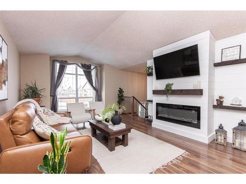 139 Timberstone Way, Red Deer, AB - Indoor Photo Showing Living Room With Fireplace