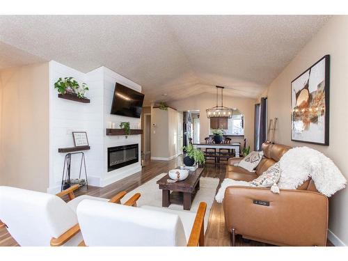 139 Timberstone Way, Red Deer, AB - Indoor Photo Showing Living Room With Fireplace