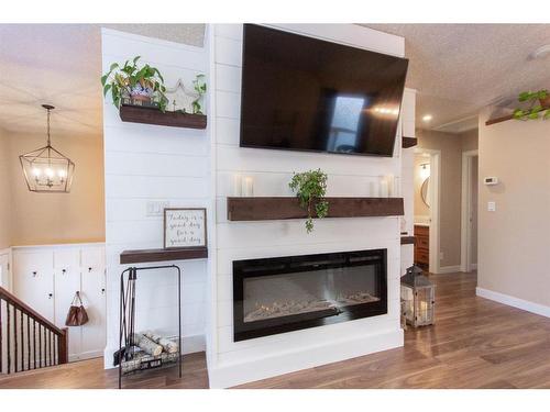 139 Timberstone Way, Red Deer, AB - Indoor Photo Showing Living Room With Fireplace