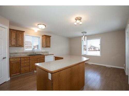 6440 Elmwood Way, Innisfail, AB - Indoor Photo Showing Kitchen With Double Sink