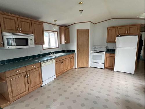 4516 59 Street, Rocky Mountain House, AB - Indoor Photo Showing Kitchen With Double Sink