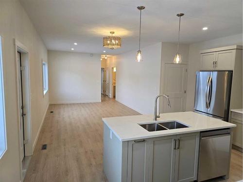 5143 52 Street, Lacombe, AB - Indoor Photo Showing Kitchen With Stainless Steel Kitchen With Double Sink With Upgraded Kitchen