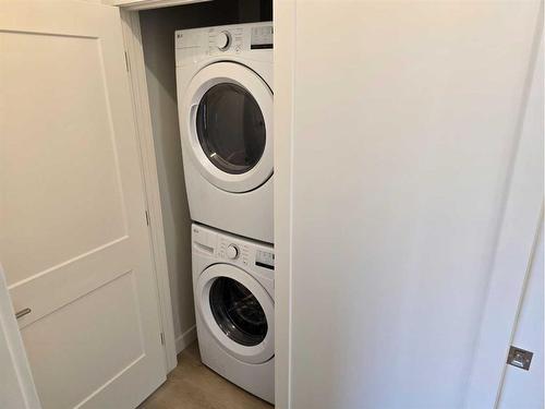 5143 52 Street, Lacombe, AB - Indoor Photo Showing Laundry Room