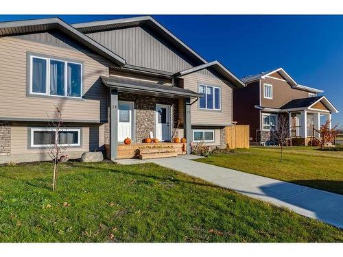 10 Ranchers Close, Lacombe, AB - Outdoor With Facade