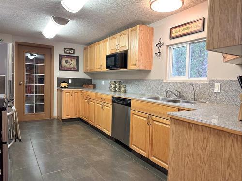 53224 Range Road 61, Rural Parkland County, AB - Indoor Photo Showing Kitchen With Double Sink