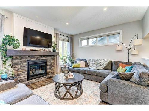 151 Ellington Crescent, Red Deer, AB - Indoor Photo Showing Living Room With Fireplace