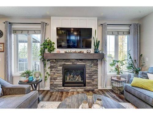 151 Ellington Crescent, Red Deer, AB - Indoor Photo Showing Living Room With Fireplace