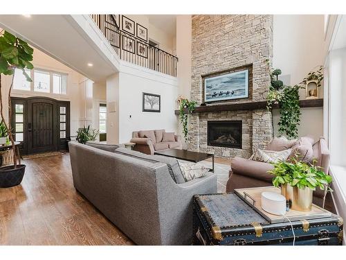 132-27111 Highway 597, Rural Lacombe County, AB - Indoor Photo Showing Living Room With Fireplace