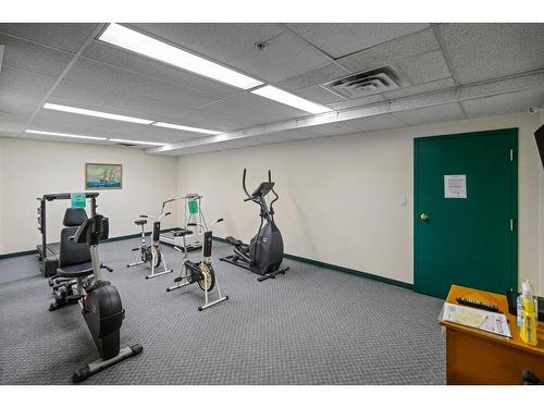 301-5402 50 Avenue, Stettler, AB - Indoor Photo Showing Gym Room