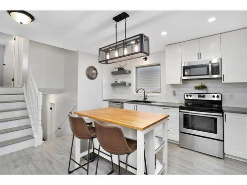 4704 43 Street, Sylvan Lake, AB - Indoor Photo Showing Kitchen With Stainless Steel Kitchen