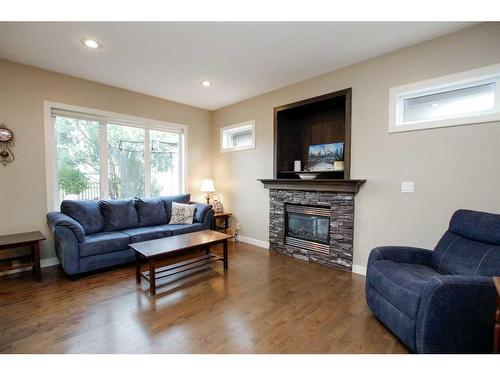 20 Connaught Crescent, Red Deer, AB - Indoor Photo Showing Living Room With Fireplace