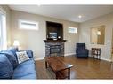 20 Connaught Crescent, Red Deer, AB  - Indoor Photo Showing Living Room With Fireplace 