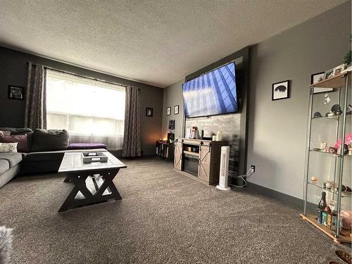 22 Peace Rose Street, Rural Lacombe County, AB - Indoor Photo Showing Living Room