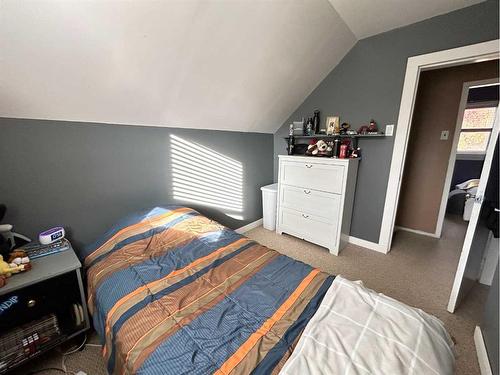 22 Peace Rose Street, Rural Lacombe County, AB - Indoor Photo Showing Bedroom