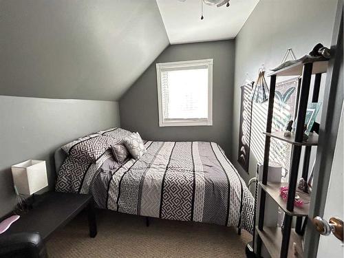 22 Peace Rose Street, Rural Lacombe County, AB - Indoor Photo Showing Bedroom