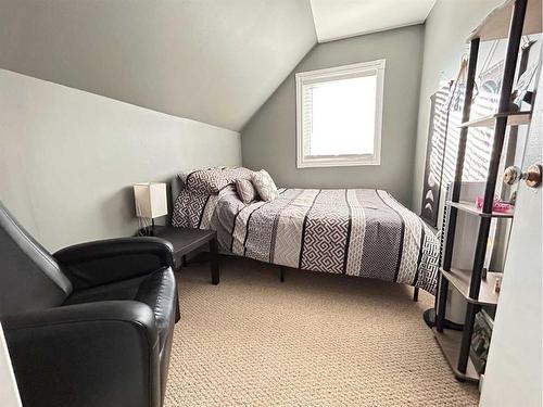 22 Peace Rose Street, Rural Lacombe County, AB - Indoor Photo Showing Bedroom