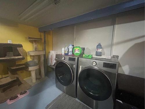 22 Peace Rose Street, Rural Lacombe County, AB - Indoor Photo Showing Laundry Room