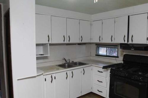 6111 Foster Street, Donalda, AB - Indoor Photo Showing Kitchen With Double Sink