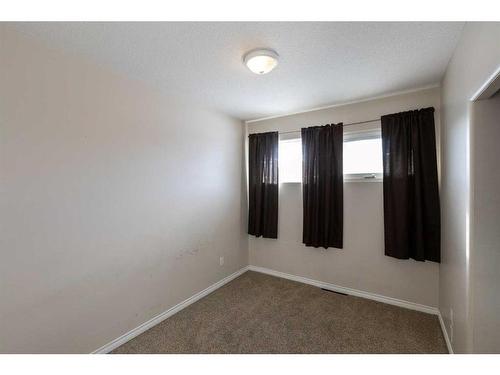 4920 43 Street, Innisfail, AB - Indoor Photo Showing Other Room