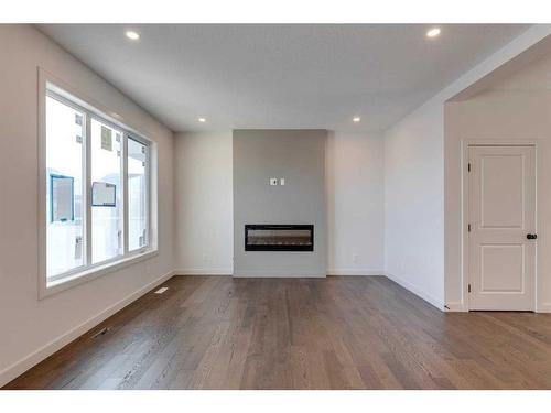 152 Sage Hill Heights Nw, Calgary, AB - Indoor Photo Showing Living Room With Fireplace