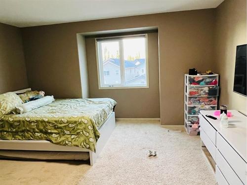 1306-30 Carleton Avenue, Red Deer, AB - Indoor Photo Showing Bedroom