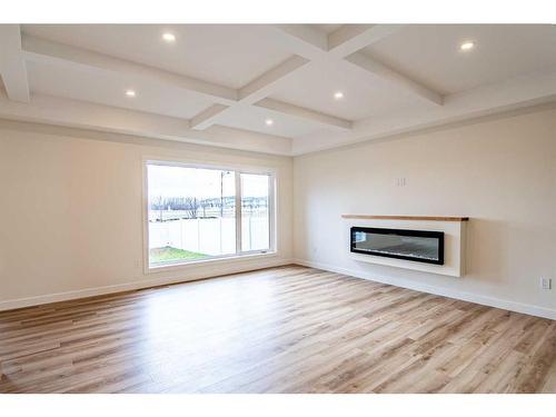 13 Larratt Close, Red Deer, AB - Indoor Photo Showing Living Room With Fireplace