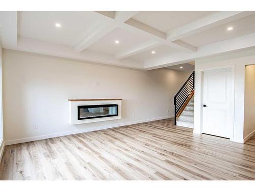 13 Larratt Close, Red Deer, AB - Indoor Photo Showing Living Room With Fireplace