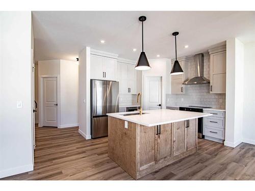 93 Lundberg Crescent, Red Deer, AB - Indoor Photo Showing Kitchen With Upgraded Kitchen