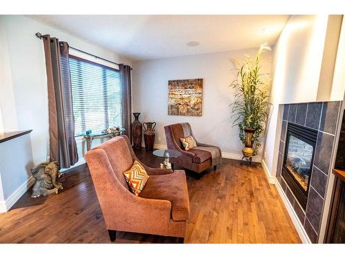 130 Sage Hill Way Nw, Calgary, AB - Indoor Photo Showing Living Room With Fireplace